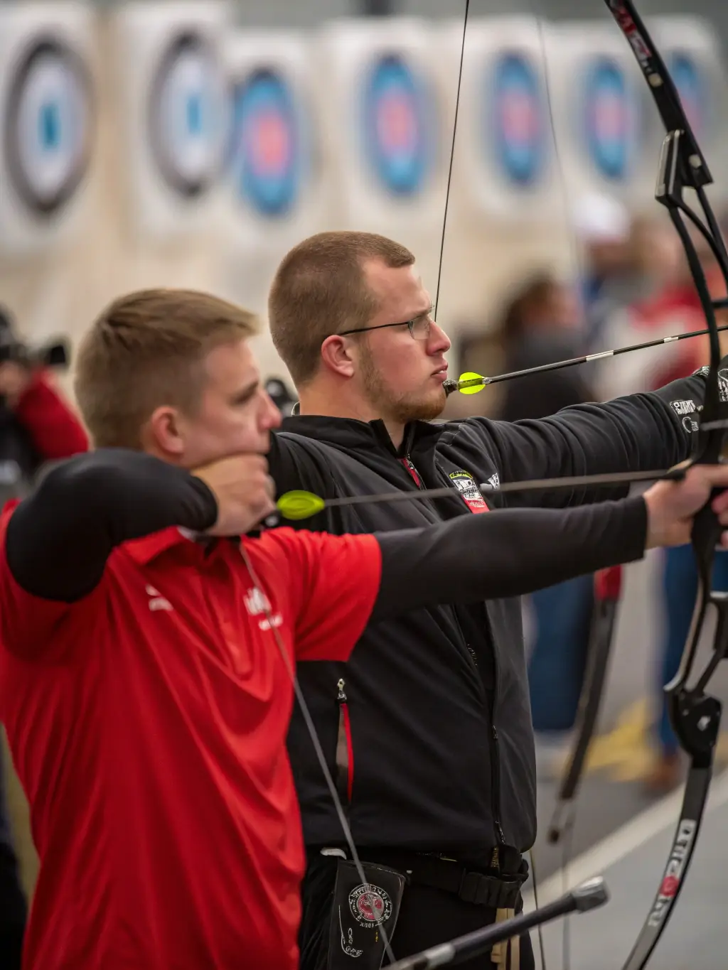 A scenic shot of archers practicing outdoors, highlighting the connection between archery and nature.